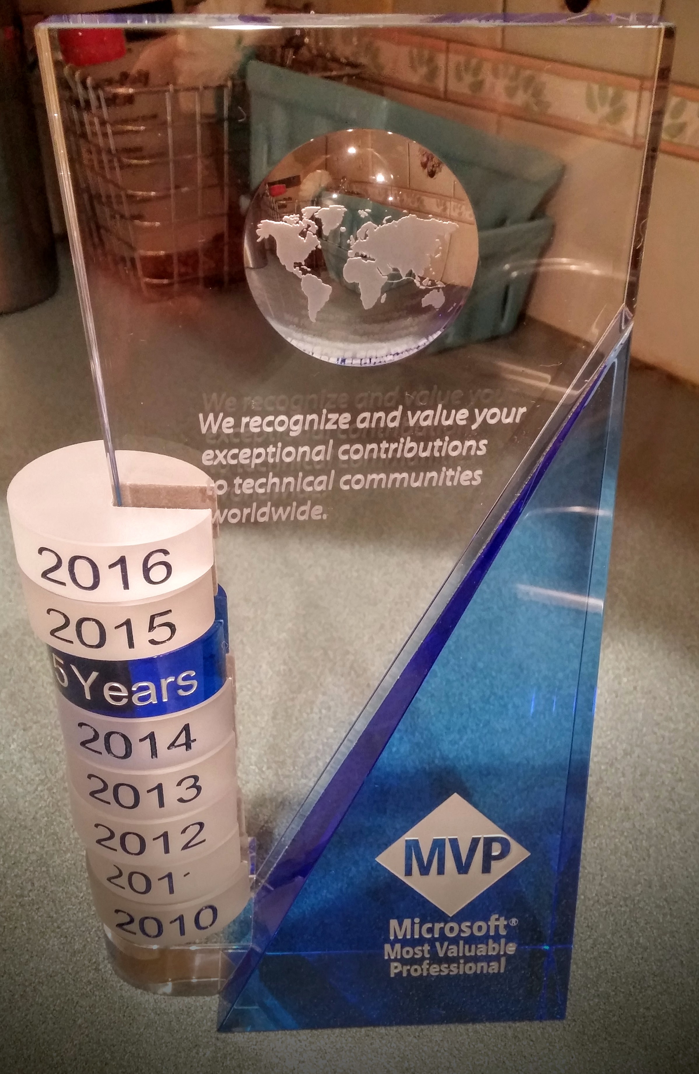 Microsoft MVP award trophy with year rings from 2010 to 2016